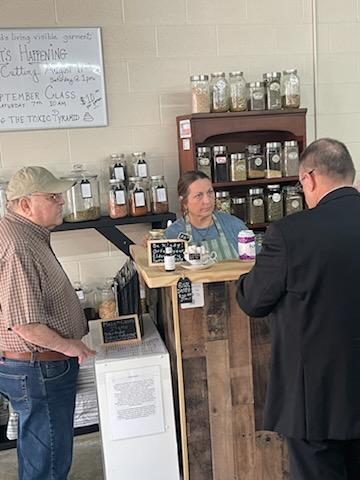 Janine helping board member Jim O'Bier